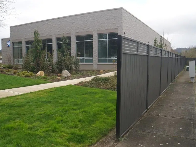 Steel privacy fence installation in British Columbia